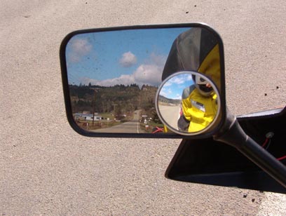 Geography typical of the area, view though the motorcycle mirror