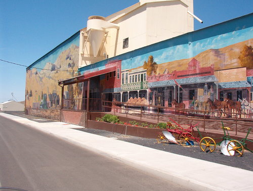 Very large mural on the backside of the grain elevator North of town