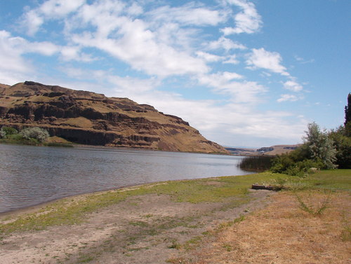 View of the bluffs towering of the Snake River downstream from the bridge